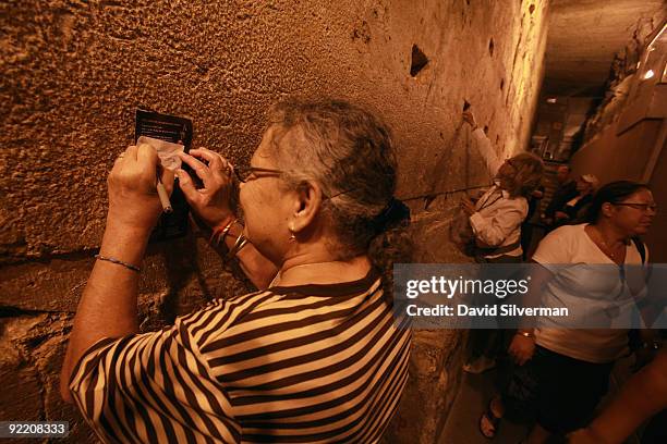 Jewish women leave notes to God in the Western Wall tunnels, on October 22, 2009 in Jerusalem's Old City. The Israeli Government Press Office...