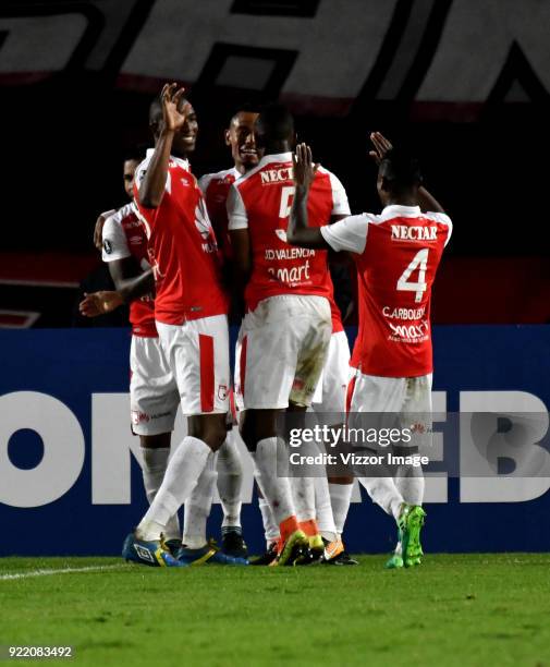 William Tesillo of Independiente Santa Fe celebrates with teammates after scoring during a second leg match between Independiente Santa Fe and...