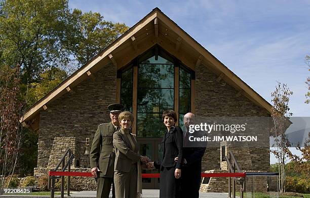 Tim and Sandy Day , the main contributors to the chapel, stand with Commandant of the Marine Corps General James Conway and his wife as they prepare...