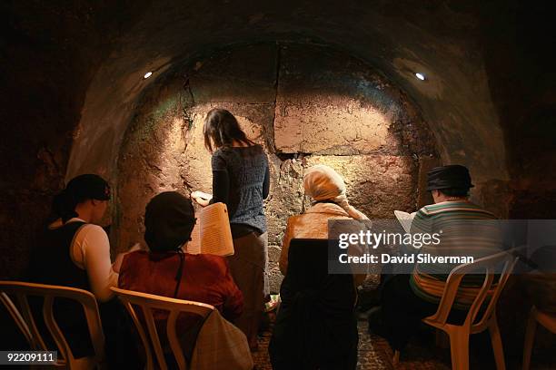 Religious Jewish women pray in a niche in the Western Wall tunnels, on October 22, 2009 in Jerusalem's Old City. The Israeli Government Press Office...