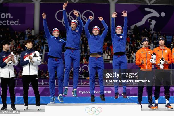 Gold medalists Havard Bokko, Sindre Henriksen, Simen Spieler Nilsen and Sverre Lunde Pedersen of Norway celebrate during the victory ceremony after...