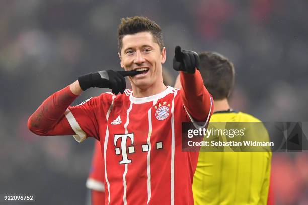 Robert Lewandowski of Bayern Muenchen celebrates after scoring his teams fifth goal during the UEFA Champions League Round of 16 First Leg match...