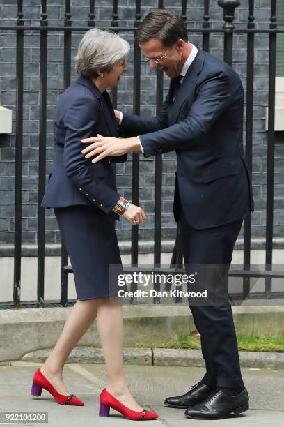 British Prime Minister Theresa May greets Prime Minister of the Netherlands Mark Rutte outside Downing Street on February 21, 2018 in London,...