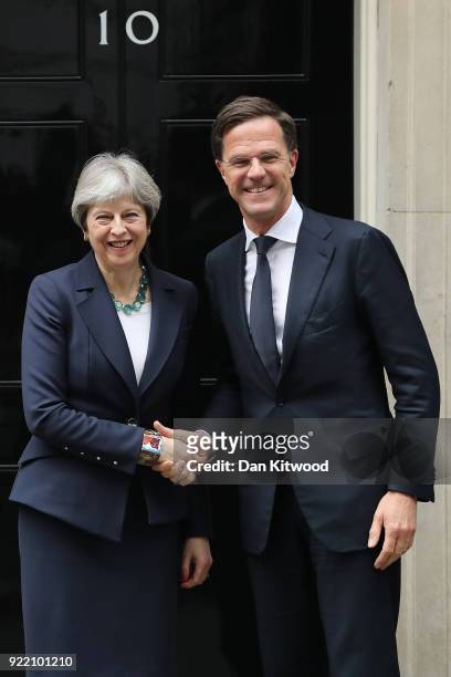 British Prime Minister Theresa May shakes hands with Prime Minister of the Netherlands Mark Rutte outside Downing Street on February 21, 2018 in...