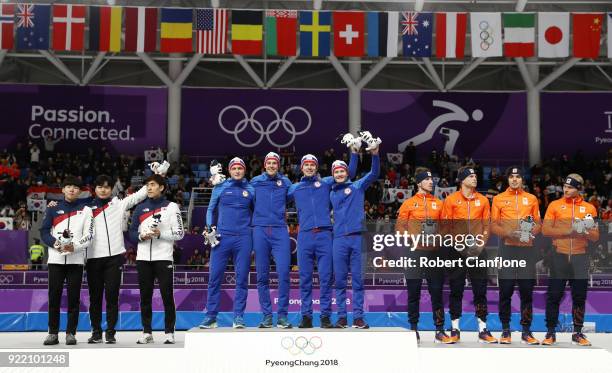 Silver medalists Seung-Hoon Lee, Jaewon Chung and Min Seok Kim of Korea, gold medalists Havard Bokko, Sindre Henriksen, Simen Spieler Nilsen and...