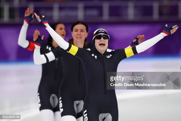 Mia Manganello, Heather Bergsma and Brittany Bowe of the United States celebrate after winning the bronze medal during the Speed Skating Ladies' Team...