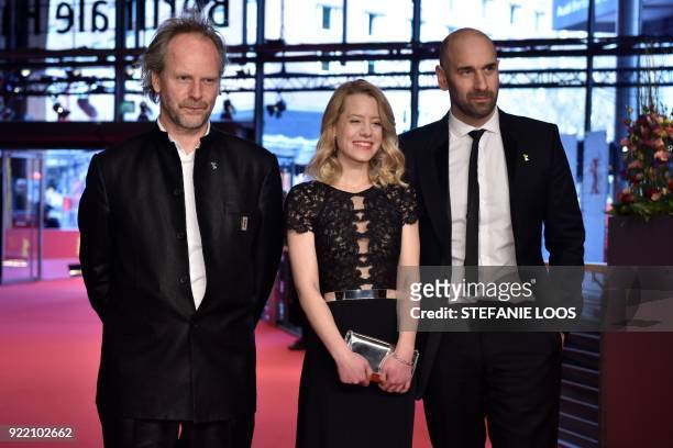 German director Philip Groening, German actress Julia Zange and Swiss actor Urs Jucker pose on the red carpet before the premiere of the film "My...