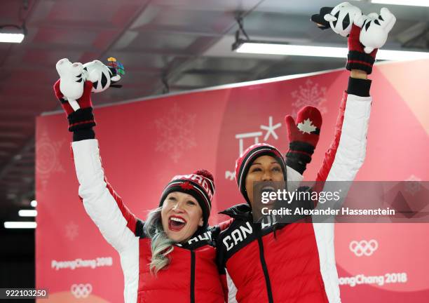 Kaillie Humphries and Phylicia George of Canada celebrate winning bronze during the Women's Bobsleigh heats on day twelve of the PyeongChang 2018...