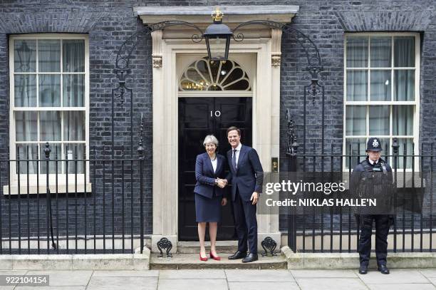 Britain's Prime Minister Theresa May greets Prime Minister of the Netherlands, Mark Rutte outside No 10 Downing street, in central London on February...