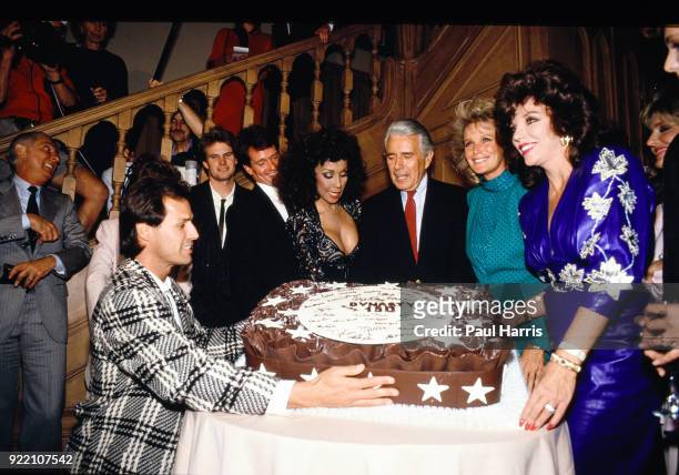 Members of the cast including Diahann Carroll, Joan Collins, John Forsythe and Linda Evans at a party celebrating the production of 150 episodes of...