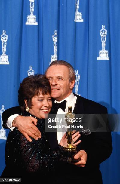 Kathy Bates Wins for Supporting Actress in a Miniseries at the 1991 Oscars and celebrates backstage with Anthony Hopkins March 25, 1991