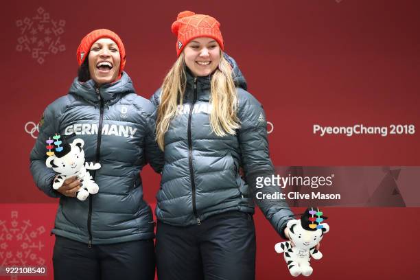 Mariama Jamanka and Lisa Buckwitz of Germany celebrate winning gold during the Women's Bobsleigh heats on day twelve of the PyeongChang 2018 Winter...