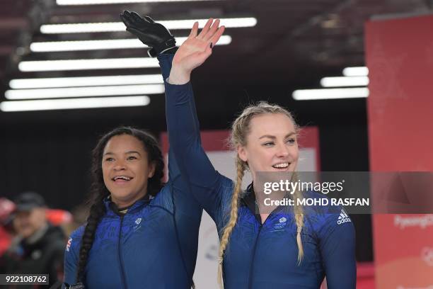 Britain's Mica Mcneill and Britain's Mica Moore compete in the women's bobsleigh heat 4 final run during the Pyeongchang 2018 Winter Olympic Games at...