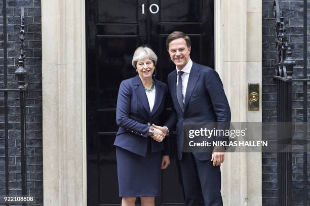 Britain's Prime Minister Theresa May greets Prime Minister of the Netherlands, Mark Rutte outside No 10 Downing street, in central London on February...