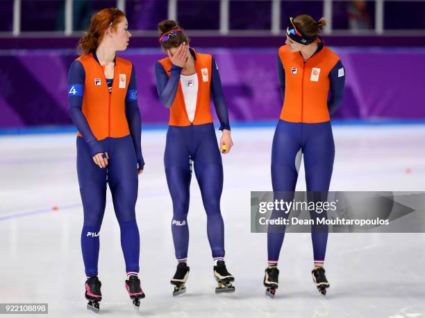 Antoinette De Jong, Ireen Wust and Lotte Van Beek of the Netherlands react after being defeated by Japan in the gold medal race during the Speed...