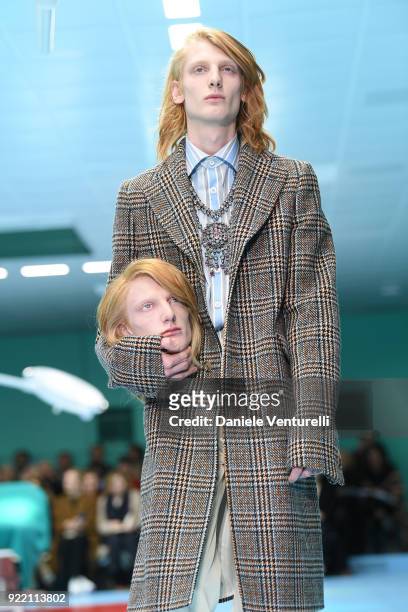 Model walks the runway at the Gucci show during Milan Fashion Week Fall/Winter 2018/19 on February 21, 2018 in Milan, Italy.