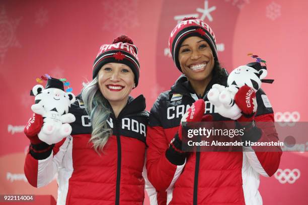 Kaillie Humphries and Phylicia George of Canada celebrate winning bronze during the Women's Bobsleigh heats on day twelve of the PyeongChang 2018...