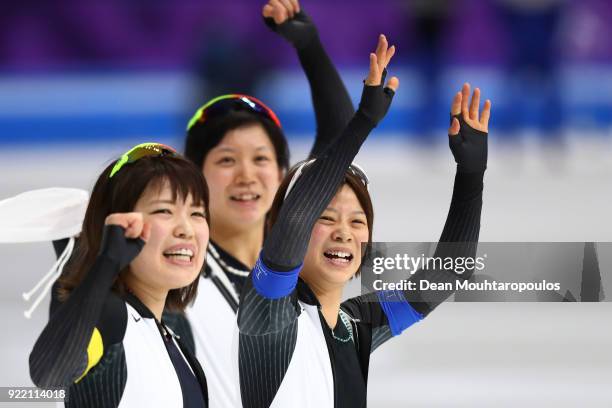 Ayano Sato, Nana Takagi and Miho Takagi of Japan celebrate after winning the gold medal during the Speed Skating Ladies' Team Pursuit Final A against...