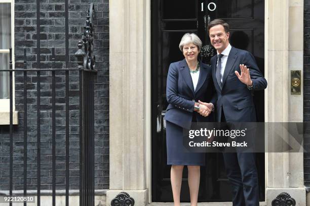 British Prime Minister Theresa May shakes hands with Prime Minister of the Netherlands Mark Rutte outside Downing Street on February 21, 2018 in...