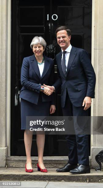 British Prime Minister Theresa May shakes hands with Prime Minister of the Netherlands Mark Rutte outside Downing Street on February 21, 2018 in...