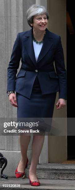 British Prime Minister Theresa May walks to greet Prime Minister of the Netherlands Mark Rutte outside Downing Street on February 21, 2018 in London,...