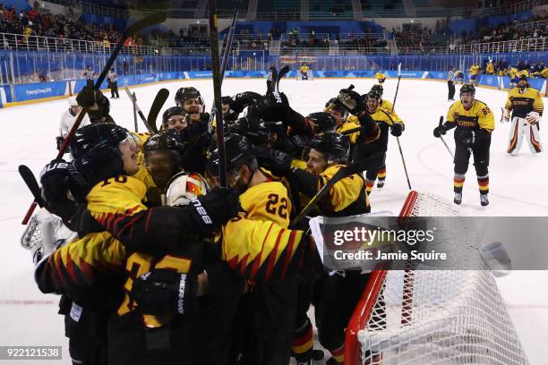 Team Germany celebrates after defeating Sweden 4-3 in overtime during the Men's Play-offs Quarterfinals game on day twelve of the PyeongChang 2018...