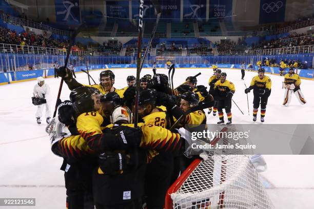 Team Germany celebrates after defeating Sweden 4-3 in overtime during the Men's Play-offs Quarterfinals game on day twelve of the PyeongChang 2018...