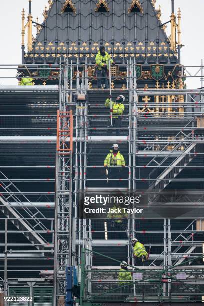 Work men move scaffolding on the Elizabeth Tower commonly known as Big Ben on February 21, 2018 in London, England. MPs will leave the Palace of...