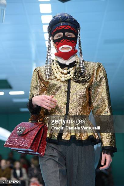 Model walks the runway at the Gucci show during Milan Fashion Week Fall/Winter 2018/19 on February 21, 2018 in Milan, Italy.