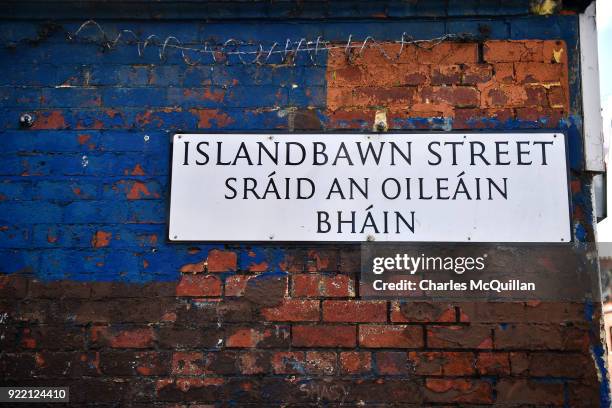 Dual Irish-English language street sign can be seen on February 21, 2018 in Belfast, Northern Ireland. Talks to restore the Northern Ireland power...