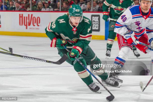 Tyler Ennis of the Minnesota Wild skates with the puck against the New York Rangers during the game at the Xcel Energy Center on February 13, 2018 in...