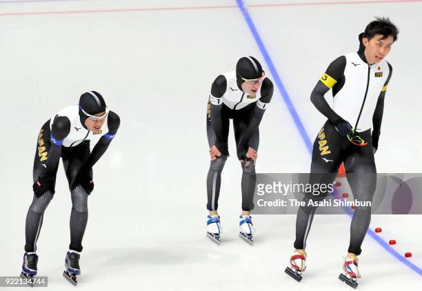 Ryosuke Tsuchiya, Shane Williamson and Seitaro Ichinohe of Japan react after competing in the Speed Skating Men's Team Pursuit Final C against Italy...