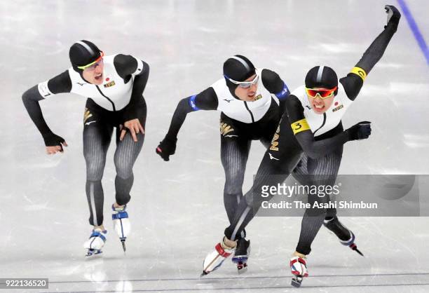 Shane Williamson, Ryosuke Tsuchiya and Seitaro Ichinohe of Japan react after competing in the Speed Skating Men's Team Pursuit Final C against Italy...