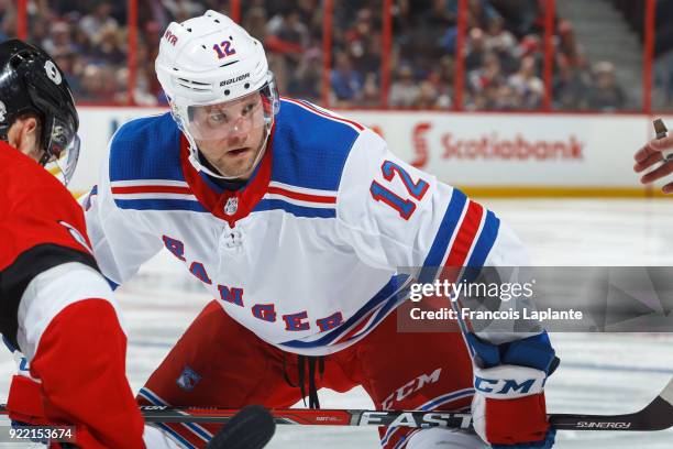 Peter Holland of the New York Rangers takes position for a faceoff against the Ottawa Senators at Canadian Tire Centre on February 17, 2018 in...