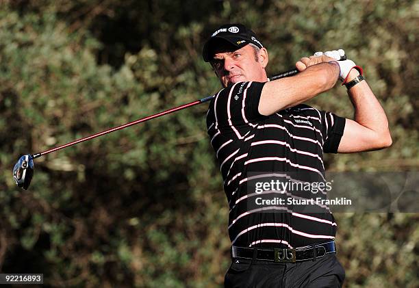 Paul McGinley of Ireland plays his tee shot on the third hole during the first round of the Castello Masters Costa Azahar at the Club de Campo del...