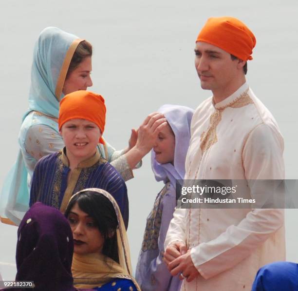 Canadian Prime Minister Justin Trudeau and his wife Sophie Gregoire Trudeau with their son Xavier and daughter Ella-Grace paying obeisance, on...