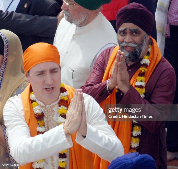 Canadian Prime Minister Justin Trudeau with his Defence Minister Harjit Sajjan Singh paying obeisance, on February 21, 2018 at Golden Temple in...