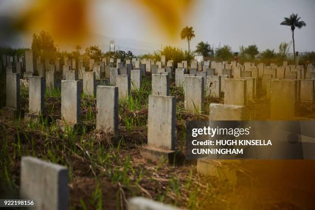 Headstones line the Waterloo Ebola graveyard in Waterloo, Sierra Leone on December 14, 2017. The 2014-16 outbreak of the highly contagious and often...