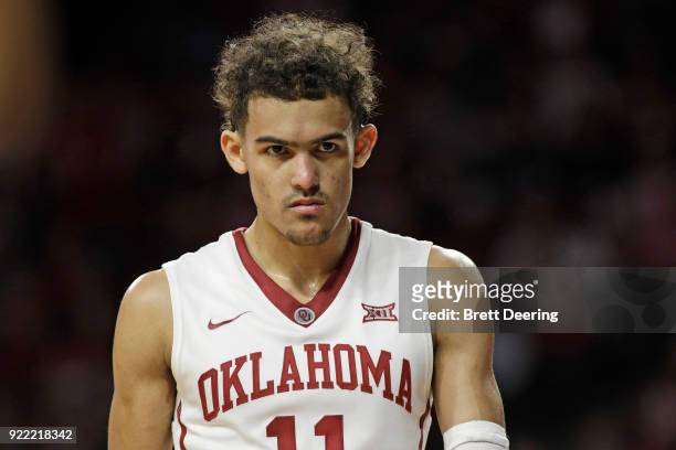 Trae Young of the Oklahoma Sooners looks on during the game against the Texas Longhorns at Lloyd Noble Center on February 24, 2018 in Norman,...