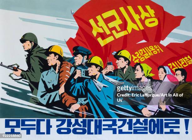 North Korean propaganda poster depicting workers and soldiers, Pyongan Province, Pyongyang, North Korea on December 6, 2017 in Pyongyang, North Korea.