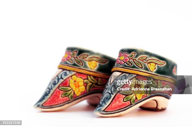 antique ceramic chinese lotus slippers - foot binding stock pictures, royalty-free photos & images