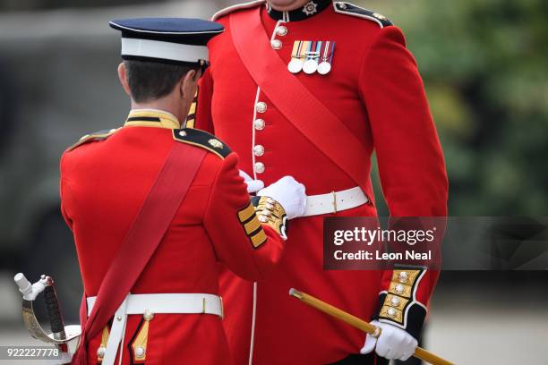 Soldiers from the Coldstream Guards make final adjustment before they take part in the annual Major General's Inspection at Victoria barracks on...