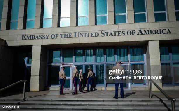 Marines stand outside the Embassy of the United State of America in Havana, on February 21, 2018.