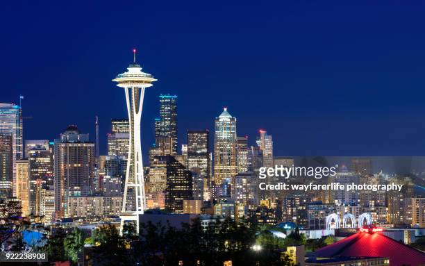 panorama view of seattle skyline and space needle tower - seattle needle stock pictures, royalty-free photos & images