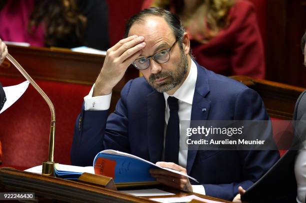 French Prime Minister Edouard Philippe reacts as Ministers answer deputies questions during a session of questions to the government at Assemblee...