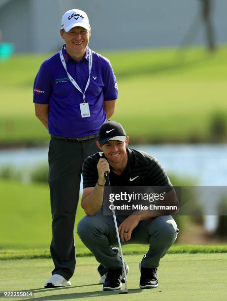 Rory McIlroy of Northern Ireland looks on with his putting coach Phil Kenyon during a pro-am for the Honda Classic on February 21, 2018 in Palm Beach...