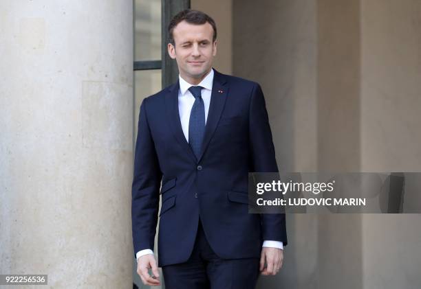French President Emmanuel Macron looks on after a meeting with the Liberian President at the Elysee presidential palace on February 21, 2018 in Paris.