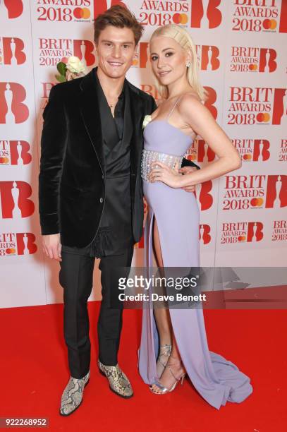 Oliver Cheshire and Pixie Lott attends The BRIT Awards 2018 held at The O2 Arena on February 21, 2018 in London, England.