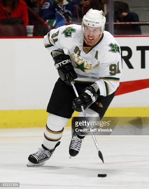 Brad Richards of the Dallas Stars skates up ice with the puck during their game against the Vancouver Canucks at General Motors Place on October 11,...