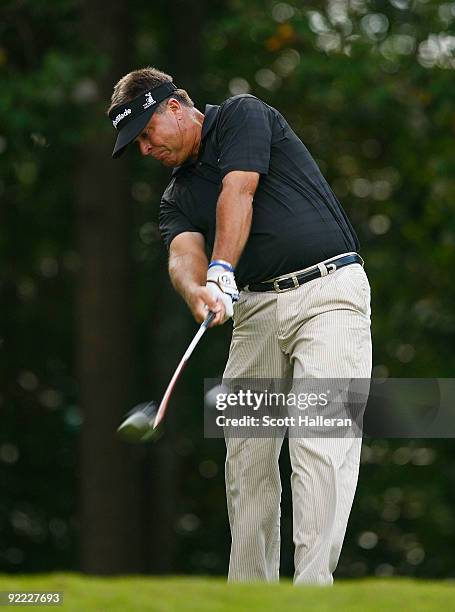 Kenny Perry hits a shot during the final round of THE TOUR Championship presented by Coca-Cola, the final event of the PGA TOUR Playoffs for the...